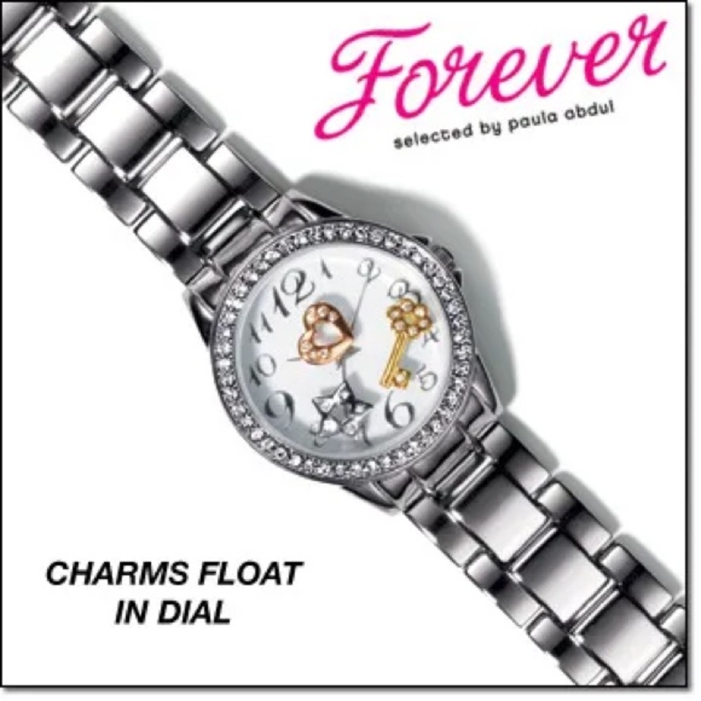 Avon Silver tone Quartz Paula Abdul Forever Sparkling Charms Ladies Watch
